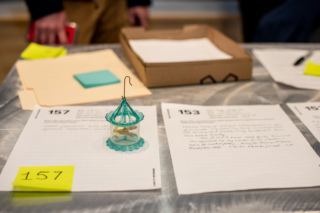 The Arts Commission staff and volunteers document objects for the Field of Histories installation, photo by Natalie Tranelli Photography